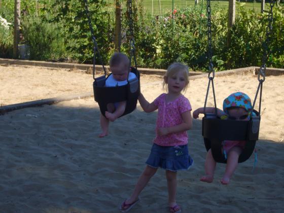 Pushing the twins on the Swing